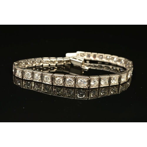 49 - AN ART DECO GRADUATED DIAMOND LINE BRACELET, brilliant cut diamonds, each set to a box setting gradu... 