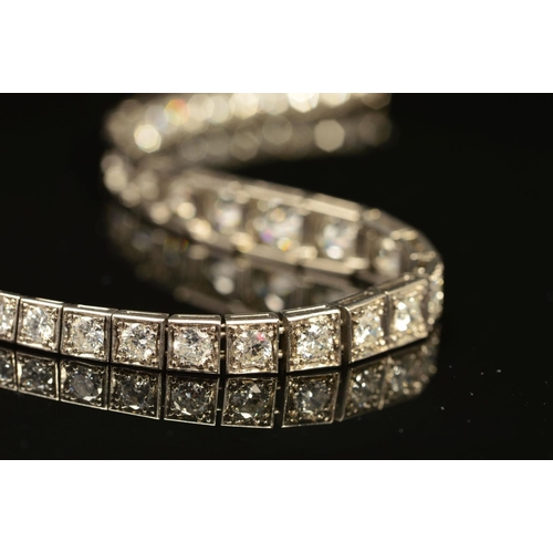 49 - AN ART DECO GRADUATED DIAMOND LINE BRACELET, brilliant cut diamonds, each set to a box setting gradu... 