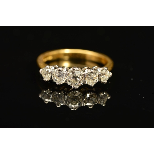 50 - AN 18CT GOLD FIVE STONE DIAMOND RING, the graduated row of old cut diamonds within claw settings, es... 