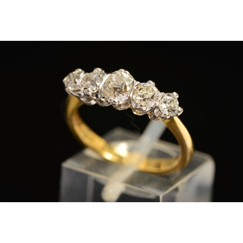 50 - AN 18CT GOLD FIVE STONE DIAMOND RING, the graduated row of old cut diamonds within claw settings, es... 