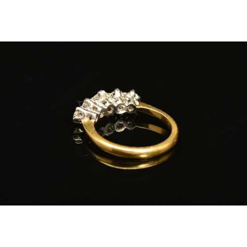 50 - AN 18CT GOLD FIVE STONE DIAMOND RING, the graduated row of old cut diamonds within claw settings, es... 