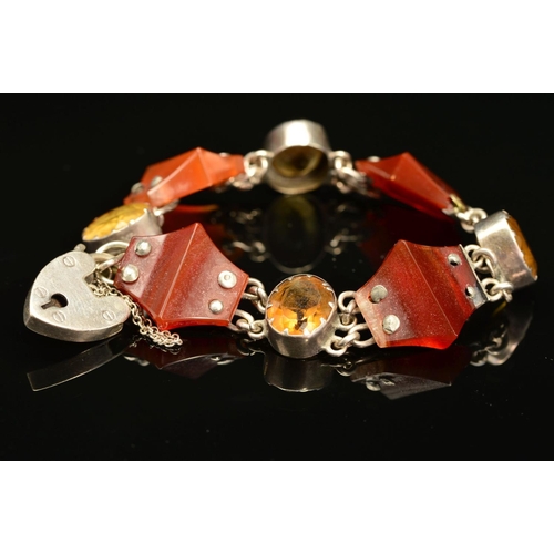 52 - A SCOTTISH BRACELET, designed as four shaped agate pieces, each interspaced by an oval citrine to th... 