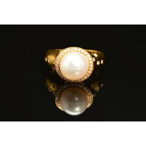 58 - A MODERN 18CT GOLD AKOYA CULTURED PEARL AND DIAMOND RING, centring on a large white cultured pearl m... 