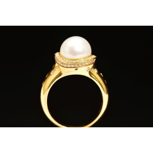 58 - A MODERN 18CT GOLD AKOYA CULTURED PEARL AND DIAMOND RING, centring on a large white cultured pearl m... 