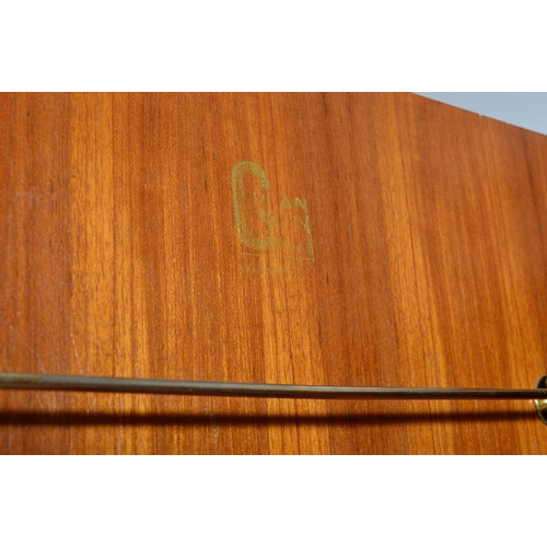 588 - IB KOFOD LARSEN, FOR GPLAN DANISH RANGE, a teak 1960's triple door wardrobe, with double bifold and ... 