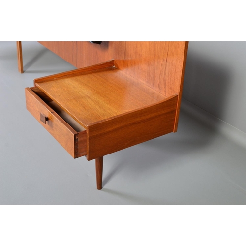 590 - IB KOFOD LARSEN, FOR GPLAN DANISH RANGE, a teak double headboard/nightstand, with black vinyl head r... 