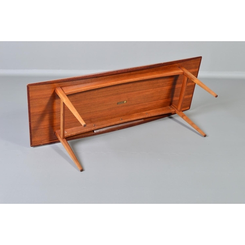 593 - GORDON RUSSELL, BROADWAY WORKS, a teak coffee table, with shaped sides on four square tapering legs,... 