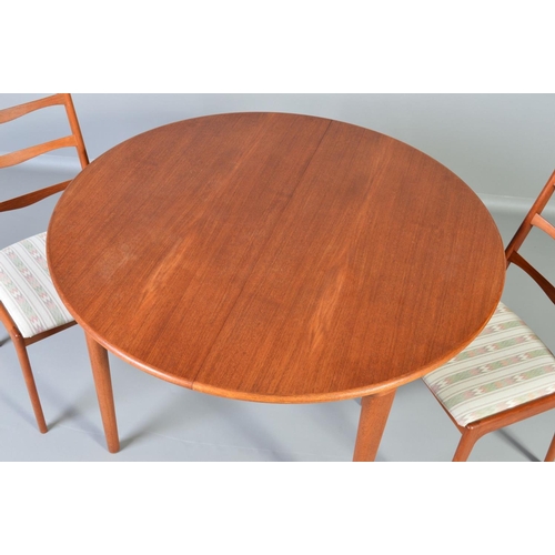 597 - ULDUM MOBELFABRIK, a teak extending dining table, the ends of a half moon design and two leaves with... 