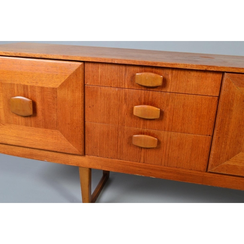 598 - A STONEHILL TEAK SIDEBOARD, the door fronts with a geometric pattern and central shaped handle, flan... 