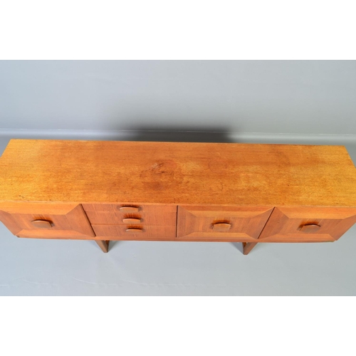 598 - A STONEHILL TEAK SIDEBOARD, the door fronts with a geometric pattern and central shaped handle, flan... 