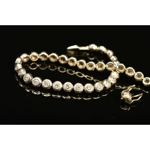 6 - A LATE 20TH CENTURY 18CT WHITE GOLD DIAMOND LINE BRACELET, estimated total diamond weight 2.28ct, co... 