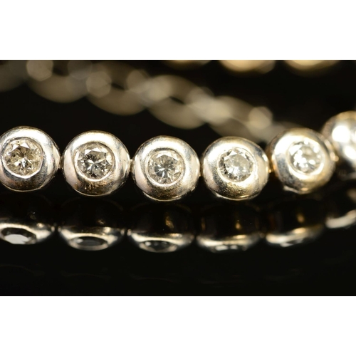 6 - A LATE 20TH CENTURY 18CT WHITE GOLD DIAMOND LINE BRACELET, estimated total diamond weight 2.28ct, co... 