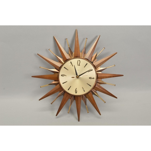 600 - A 1960S METAMEC SUNBURST CLOCK, diameter 44.5cm