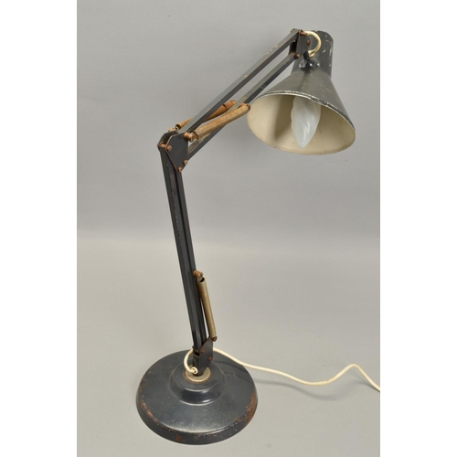 601 - AN EARLY 20TH CENTURY DARK BLUE PAINTED ANGLE POISE STYLE DESK LAMP on a sloped base