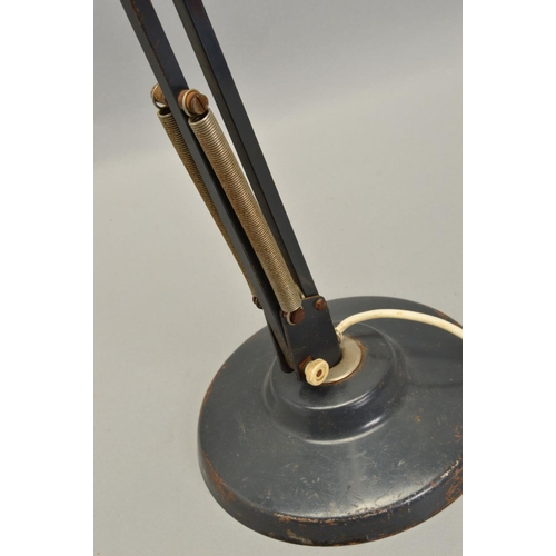 601 - AN EARLY 20TH CENTURY DARK BLUE PAINTED ANGLE POISE STYLE DESK LAMP on a sloped base