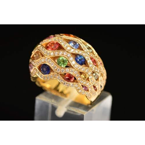 62 - A MODERN 18CT GOLD MULTI GEM AND DIAMOND FANCY BOMBE STYLE DRESS RING, lattice design incorporating ... 