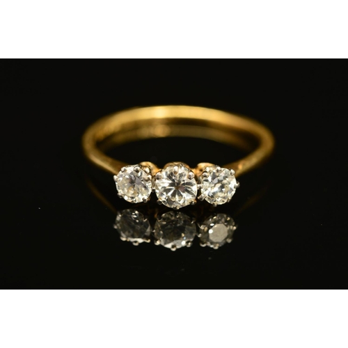 72 - A THREE STONE DIAMOND RING, designed as three graduated diamonds, two old cut and one brilliant cut,... 