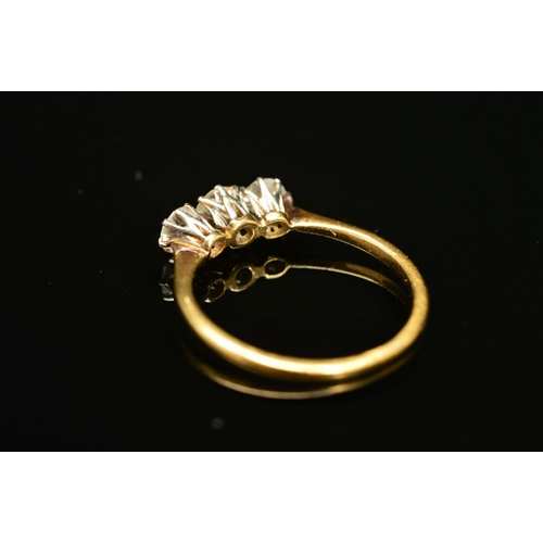 72 - A THREE STONE DIAMOND RING, designed as three graduated diamonds, two old cut and one brilliant cut,... 