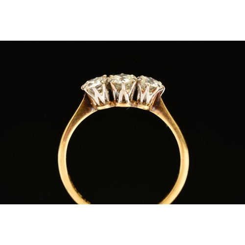 72 - A THREE STONE DIAMOND RING, designed as three graduated diamonds, two old cut and one brilliant cut,... 