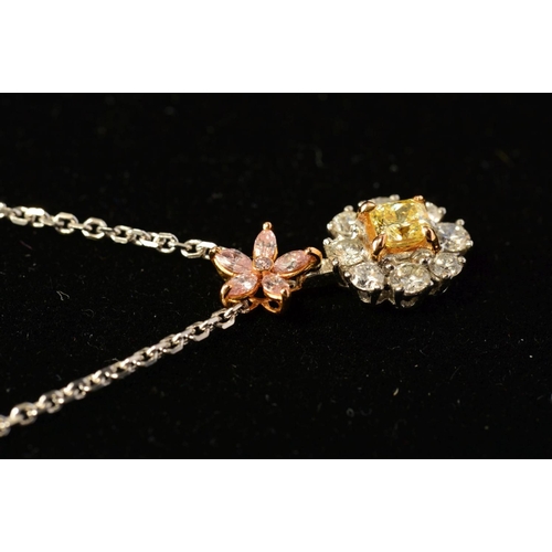 73 - A MODERN DIAMOND FLOWER PENDANT, comprised of a circular yellow and white diamond cluster suspended ... 