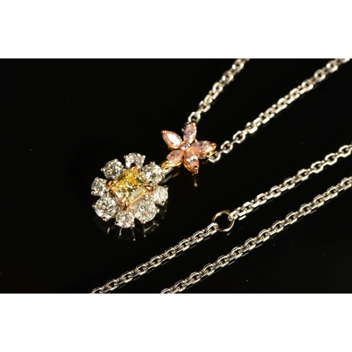 73 - A MODERN DIAMOND FLOWER PENDANT, comprised of a circular yellow and white diamond cluster suspended ... 