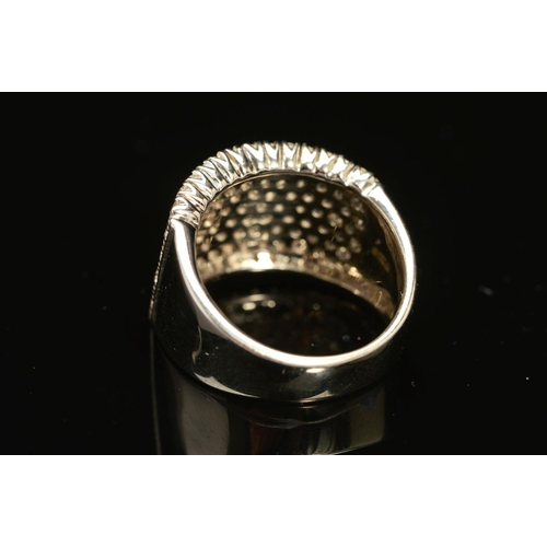 74 - A MODERN 18CT WHITE GOLD WIDE PAVE DIAMOND SET BAND, measuring approximately 14.3mm in diameter, est... 