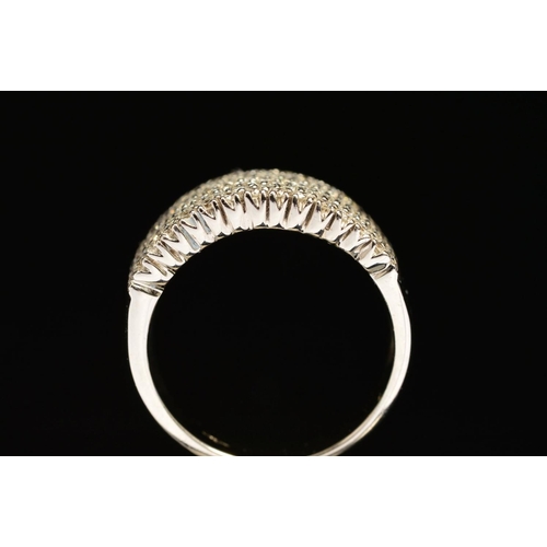 74 - A MODERN 18CT WHITE GOLD WIDE PAVE DIAMOND SET BAND, measuring approximately 14.3mm in diameter, est... 