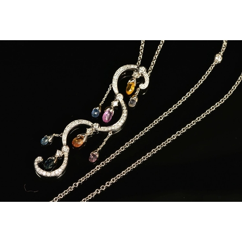 75 - A MODERN 18CT WHITE GOLD FANCY SCROLL DESIGN MULTI COLOURED SAPPHIRE AND DIAMOND PENDANT, comprised ... 