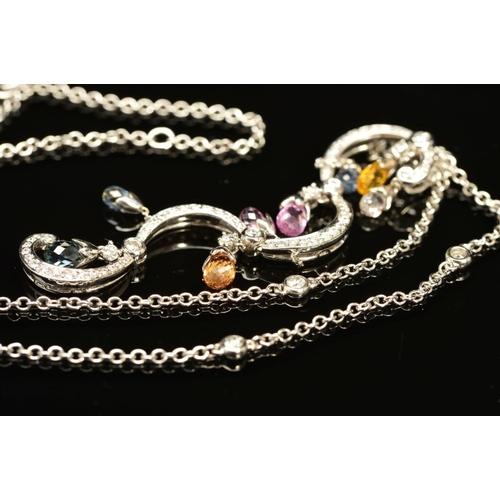 75 - A MODERN 18CT WHITE GOLD FANCY SCROLL DESIGN MULTI COLOURED SAPPHIRE AND DIAMOND PENDANT, comprised ... 