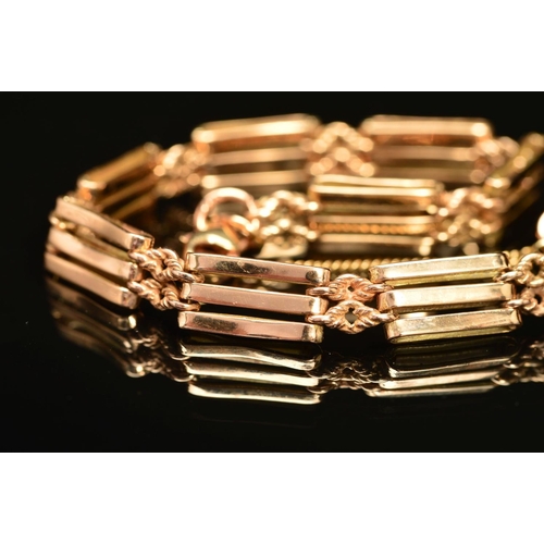 76 - AN EARLY 20TH CENTURY ROSE GOLD THREE STRAIGHT BAR AND KNOT GATE BRACELET, fitted to a later added s... 