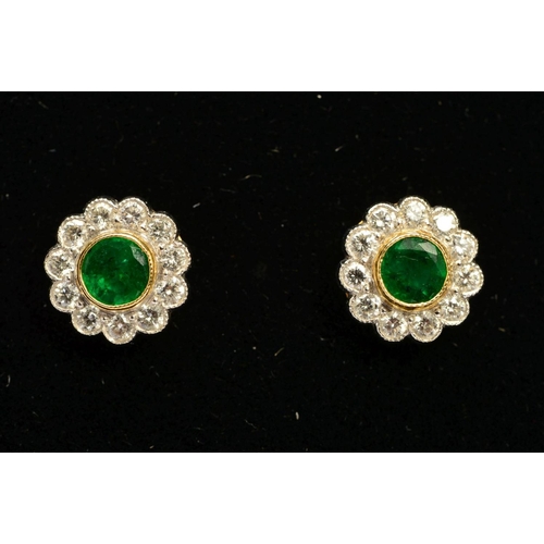 78 - A PAIR OF EMERALD AND DIAMOND STUD CLUSTER EARRINGS, each designed as a central circular emerald wit... 