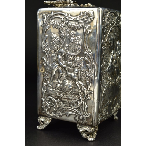 87 - AN EDWARDIAN SILVER CASED BOUDOIR OR CARRIAGE TIMEPIECE, the top with hinged carrying handle cast an... 