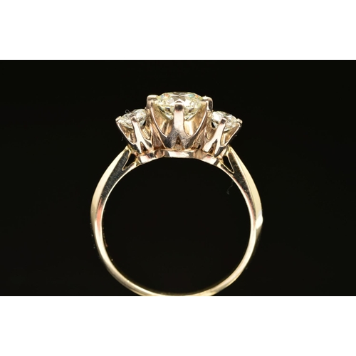 9 - A MODERN THREE STONE DIAMOND RING, centre brilliant cut diamond estimated 1.60ct, colour assessed as... 