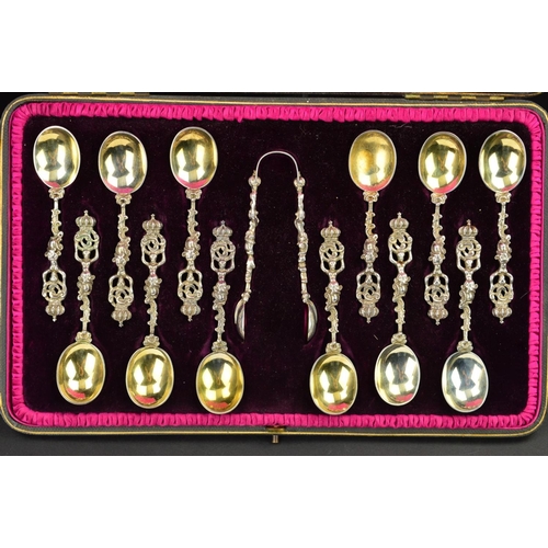 95 - A CASED SET OF TWELVE VICTORIAN SILVER TEASPOONS AND MATCHING SUGAR TONGS, cast with crown finials h... 