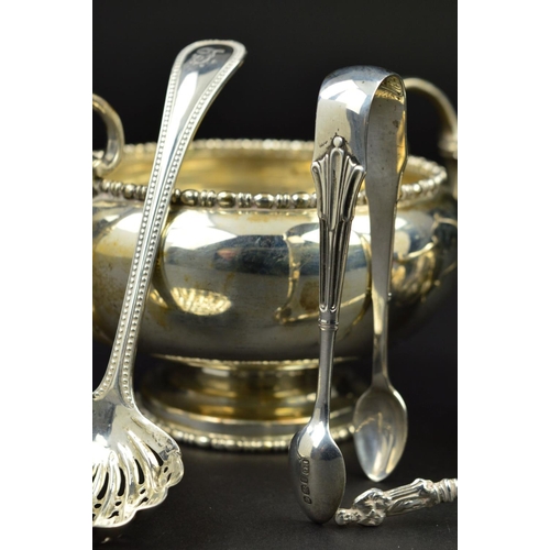 99 - A GEORGE V SILVER TWIN HANDLED SUGAR BOWL, of circular form, cast bobbin rims, 'C' scroll handles, m... 