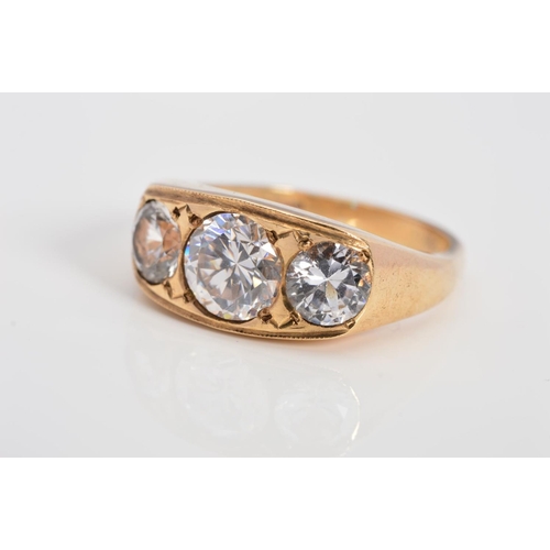 100 - A MODERN HEAVY WEIGHT 9CT GOLD THREE STONE CUBIC ZIRCONIA GYPSY RING, ring size X1/2, hallmarked 9ct... 