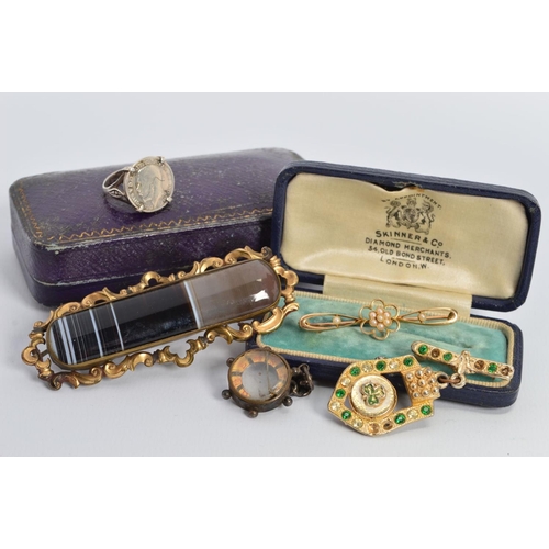 106 - A COLLECTION OF JEWELLERY, to include an early 20th Century seed pearl flower bar brooch, stamped '1... 