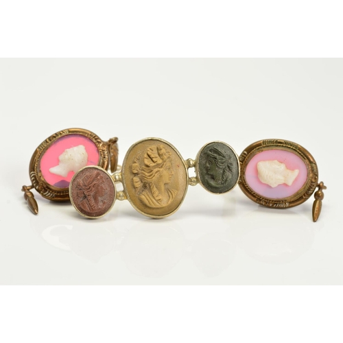 116 - A VICTORIAN LAVA CAMEO BROOCH depicting three maidens in profile, pin and hook catch, together with ... 