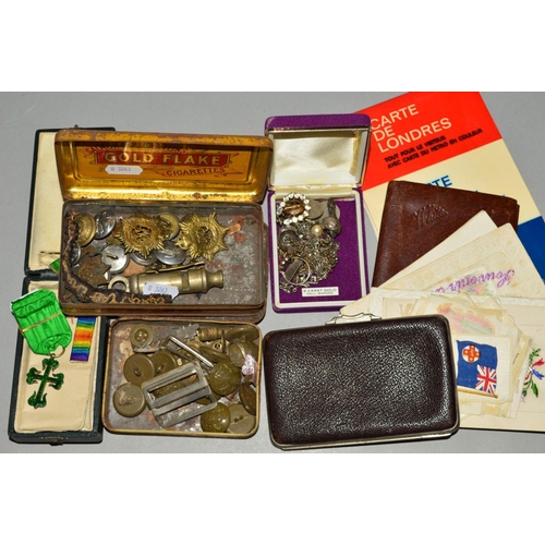 174 - A SMALL COLLECTION OF MILITARIA, including two tins of cap badges and buttons, a cased Military Orde... 