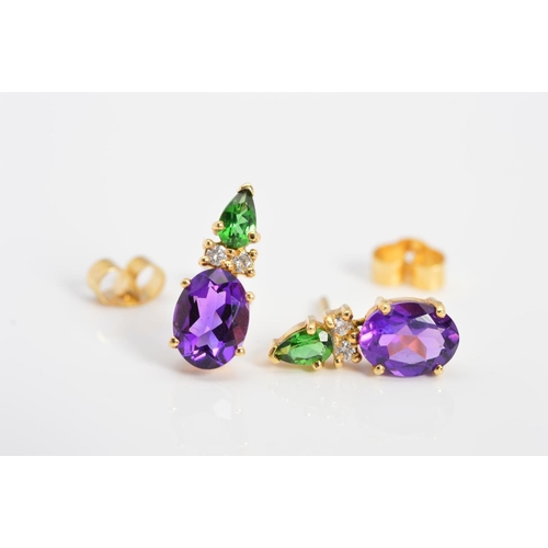 70 - A MODERN PAIR OF AMETHYST, GREEN GARNET AND DIAMOND STUD EARRINGS, post and scroll fittings, measuri... 