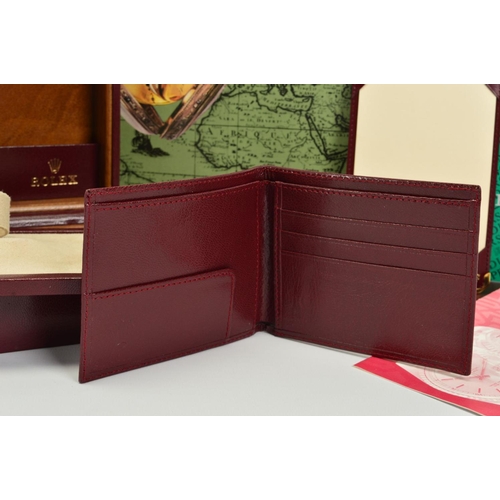 100 - A ROLEX WATCH BOX, burgundy coloured leather with a watch tray insert, serial number 53.00.08, Rolex... 