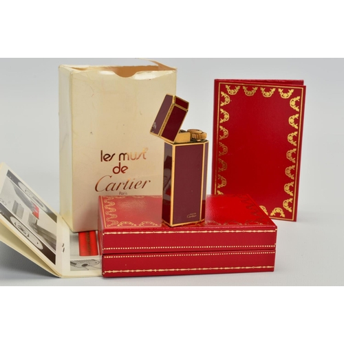 MUST DE CARTIER RED ENAMEL GILT LIGHTER base stamped Cartier