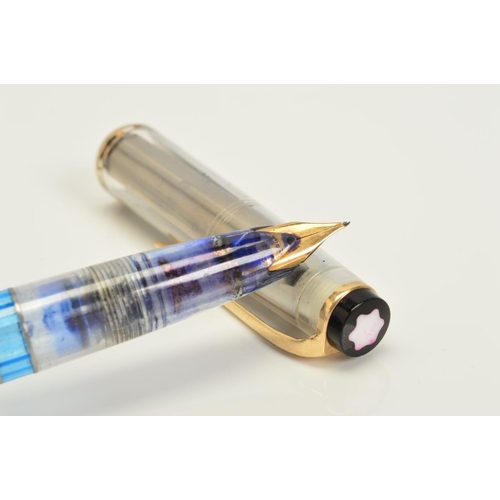 107 - A MONT BLANC 24 DEMONSTRATION FOUNTAIN PEN, transparent casing with gold plated clip and cap trim, d... 