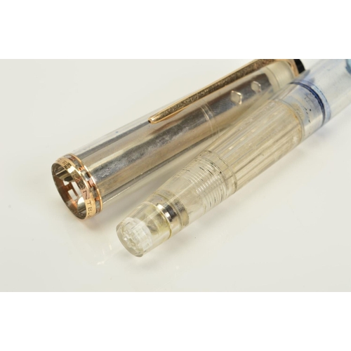 107 - A MONT BLANC 24 DEMONSTRATION FOUNTAIN PEN, transparent casing with gold plated clip and cap trim, d... 