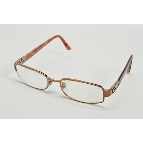 110 - A PAIR OF BULGARI READING GLASSES, with prescription lenses and brown/red coloured arms, stamped Mad... 