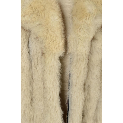 115 - A SAGA BLUE FOX FUR JACKET, with notched lapel collar, two hinged hook fastenings, the panels of fox... 