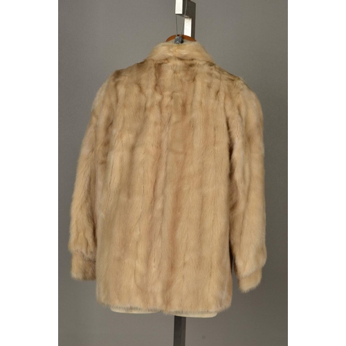 116 - AN AZURENE MINK FUR JACKET, with a mandarin collar, two hook and eye fastenings, fitted cuffs, two e... 