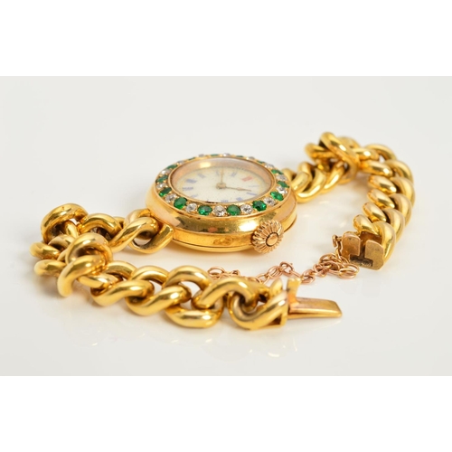 93 - AN EARLY 20TH CENTURY GOLD EMERALD AND DIAMOND WATCH, round case measuring approximately 25.0mm in d... 