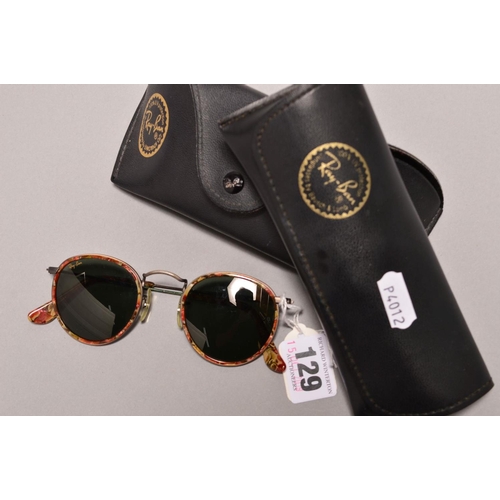 129 - A PAIR OF VINTAGE RAYBAN SUNGLASSES AND TWO CASES, with circular green lenses, marbled yellow, green... 