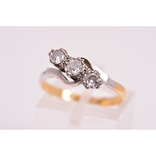 140 - A THREE STONE DIAMOND RING, designed as three round brilliant cut diamonds in illusion settings to t... 